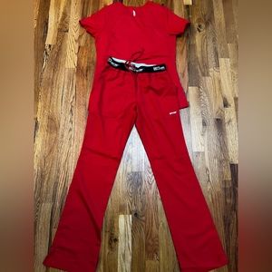 Greys pre owned in Great condition XS TOP AND XXS Bottoms. Red